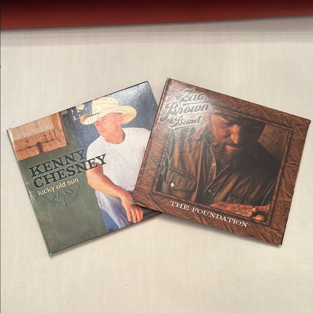 Kenny Chesney CD and Zac Brown Band CD